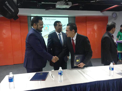 Agreement signing between Tan Sri Effendi,  The former Agriculture minister of Malaysia and President of Malaysia University of Science and Technology.